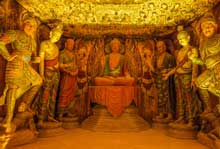 When is the peak tourist season in Dunhuang？